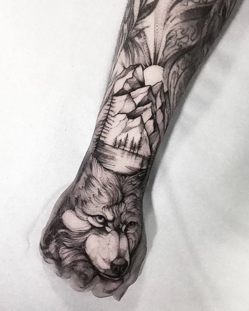 Wolf and mountain tattoo