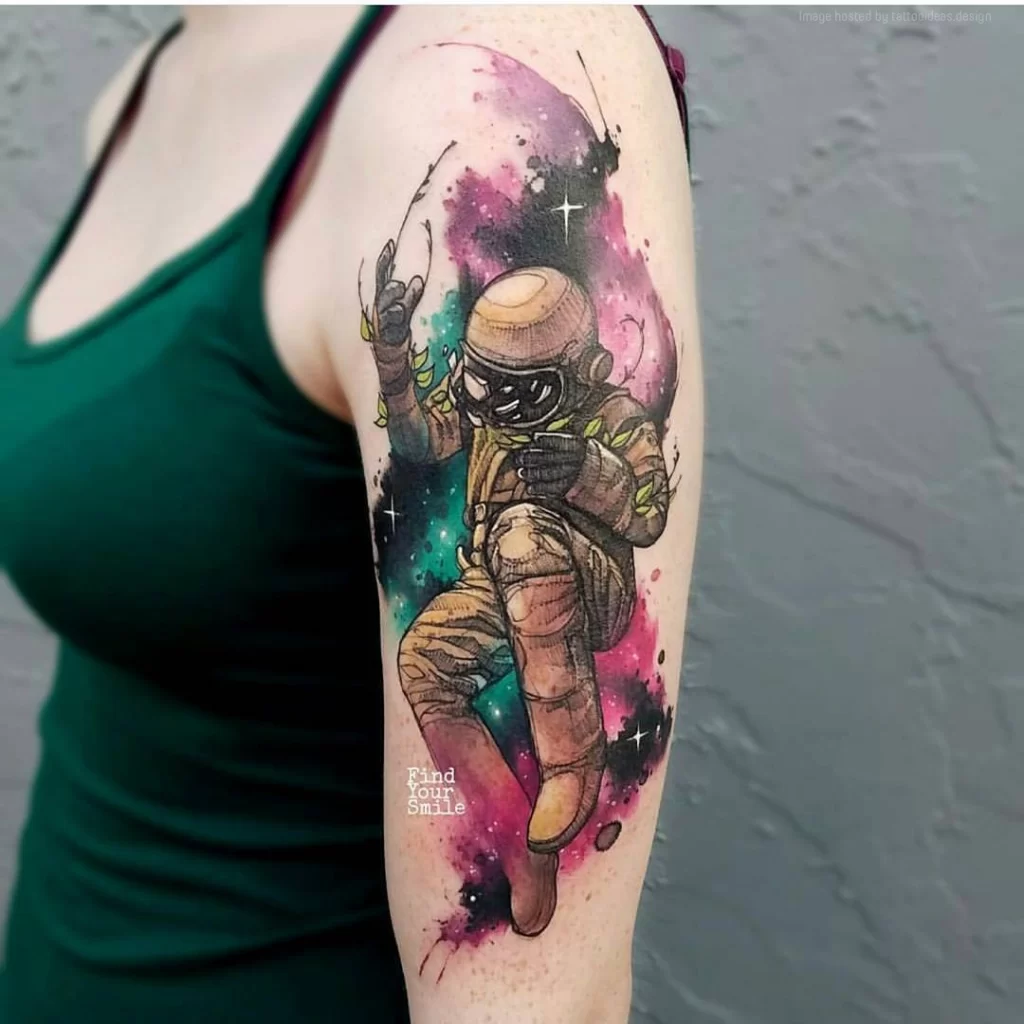 Astronaut colorful space arm tattoo