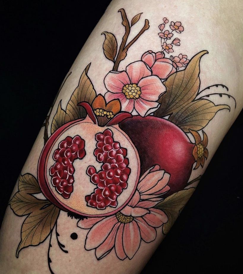 snake and pomegranate tattoo