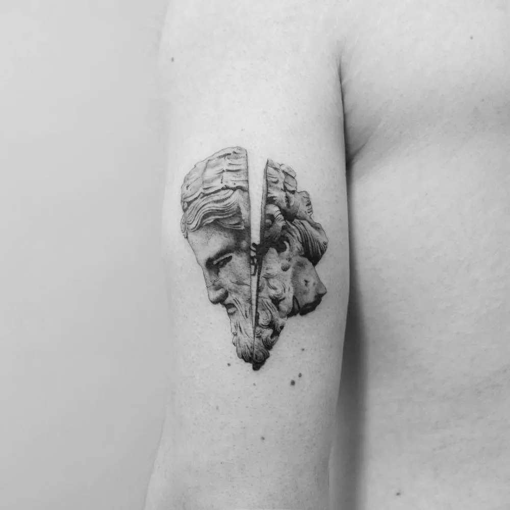 Mid evil Statue Tattoo – Simply Inked