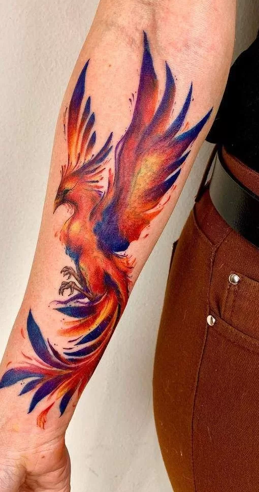 Rising Phoenix Forearm Tattoo - TATTOOGOTO