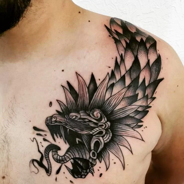 Blackwork Quetzalcoatl Tattoo - TATTOOGOTO